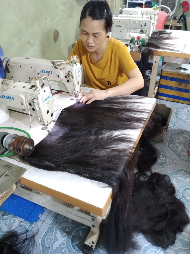 woman-sewing-hair